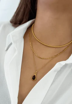 COLLAR RAKA ÓNIX BAÑADO EN ORO
