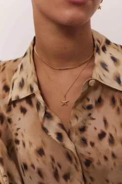 COLLAR RUCHITA BAÑADO EN ORO