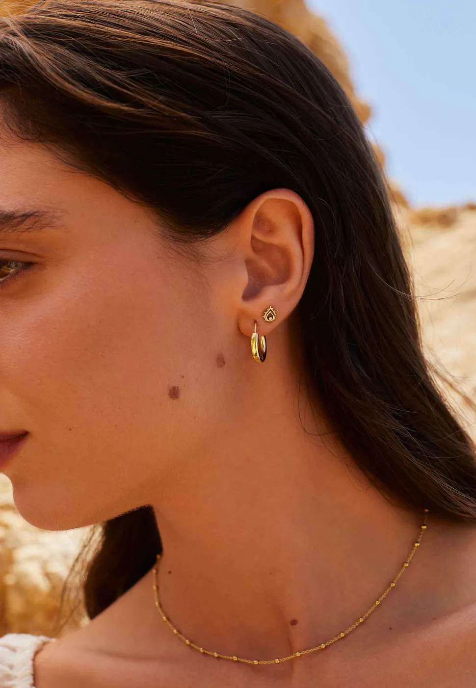PENDIENTES MAYUR BAÑADOS EN ORO