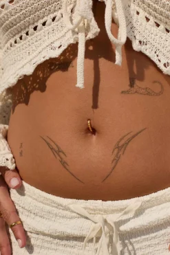 PIERCING GENDA BAÑADO EN ORO
