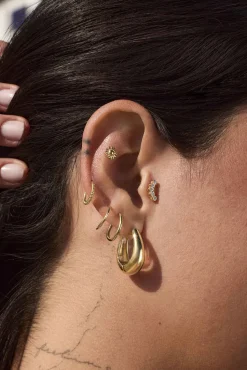 PIERCING GUMAEN BAÑADO EN ORO