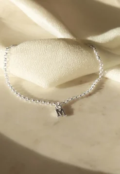 PULSERA ADAMYA LETRA