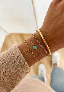 PULSERA ADAMYA LETRA BAÑADA EN ORO